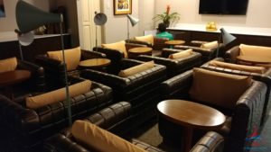 a room with couches and tables