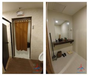 a bathroom with a shower and a shower door