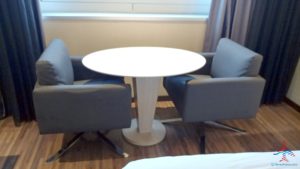 a table and chairs in a room