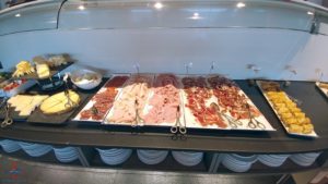 a buffet table with different types of food