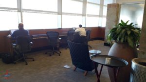 a man sitting in a chair in a room