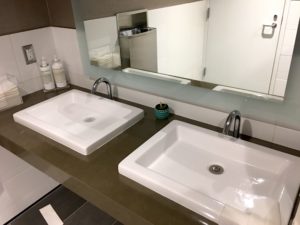 a bathroom sink with a mirror