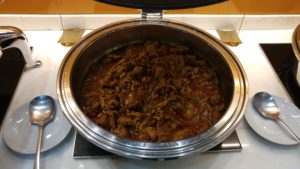 a bowl of food on a stove