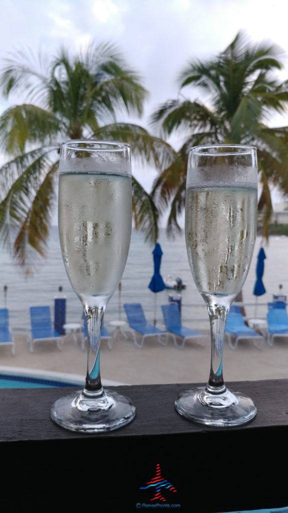 two glasses of champagne on a table