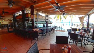 a restaurant with tables and chairs