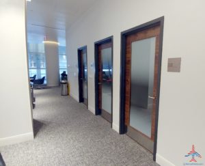 a row of doors in a hallway