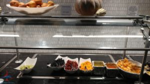 a display case with different foods