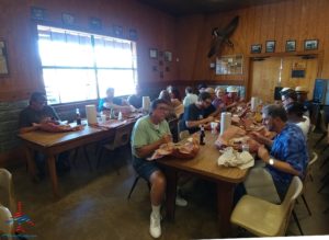 a group of people eating at a table