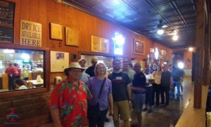 a group of people standing in a room