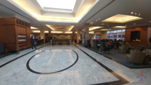 a large room with a large circular pattern on the floor