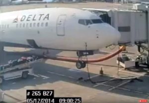 a plane being towed by a truck