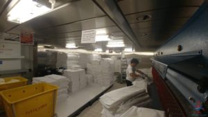 a person working in a laundry room