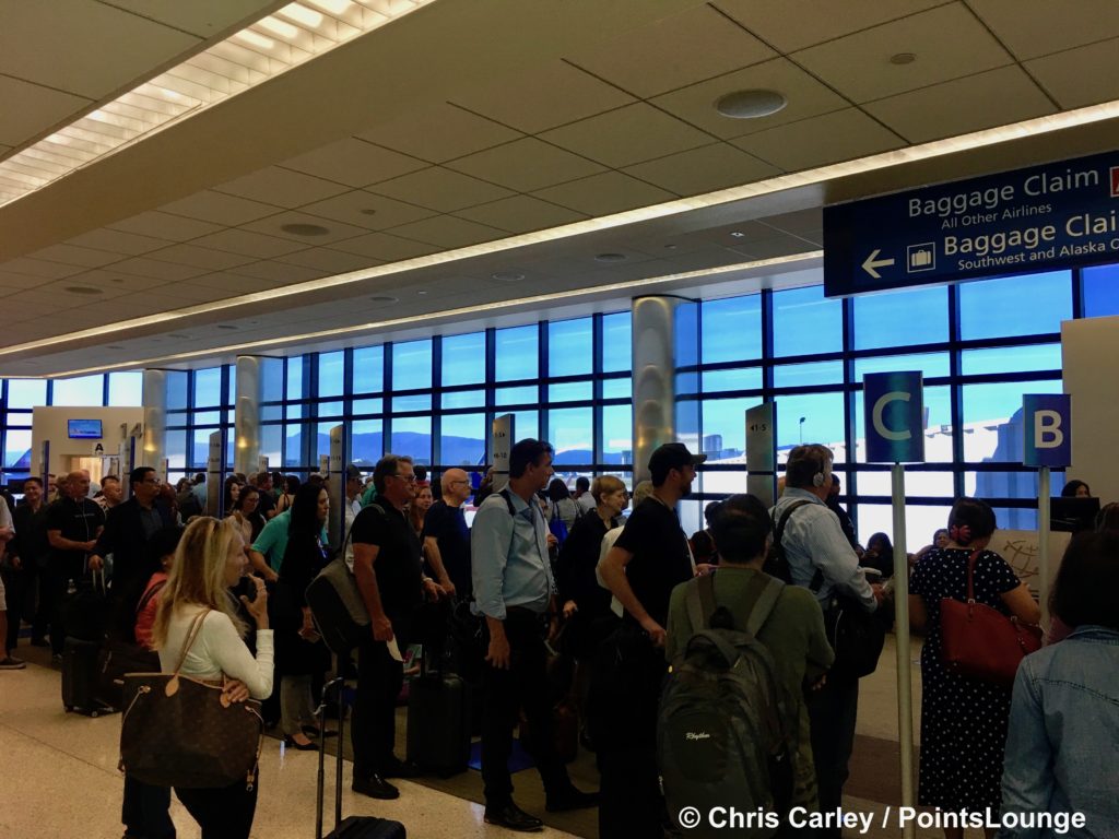 Passengers stand in their Southwest Airlines boarding groups at Norman Y. Mineta San Jose SJC Airport.
