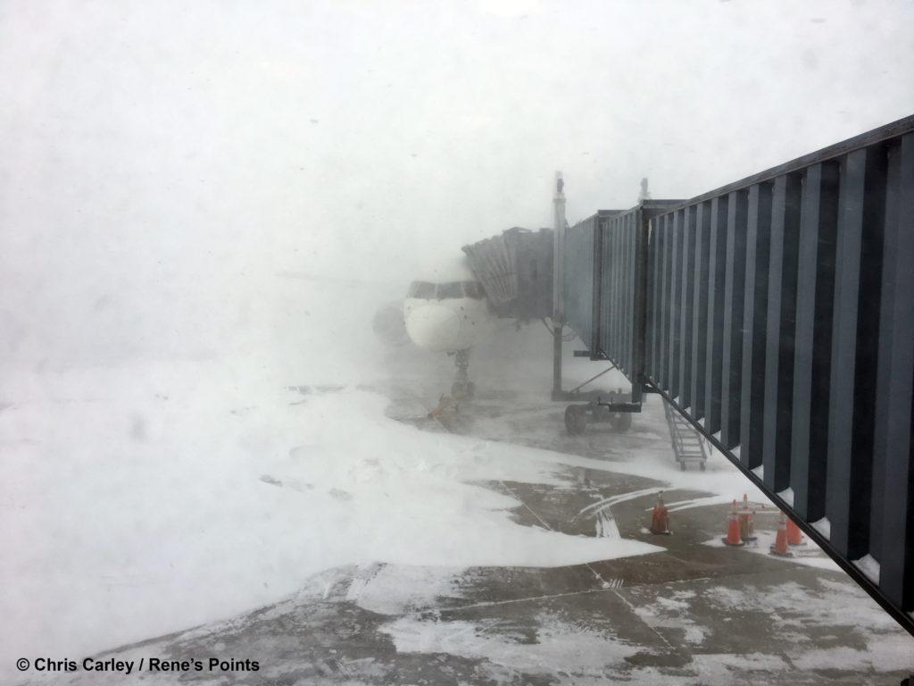 Delta 757 is seen during a blizzard at Fargo Hector International Airport.