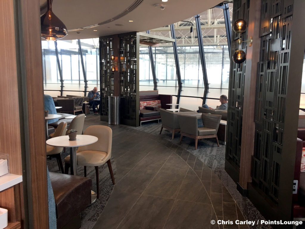 Guests relax at the Delta Sky Club Austin airport lounge at Austin-Bergstrom International Airport (AUS) in Austin, Texas. Photo © Chris Carley / PointsLounge