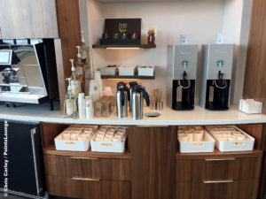 Starbucks coffee machines and tea are seen at the Delta Sky Club Austin airport lounge at Austin-Bergstrom International Airport (AUS) in Austin, Texas. Photo © Chris Carley / PointsLounge