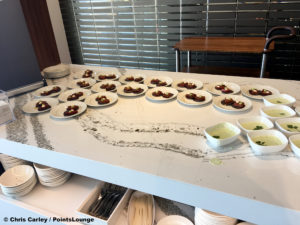 Tuna tartare is seen at the Delta Sky Club Austin airport lounge in Austin, Texas. Photo © Chris Carley / PointsLounge