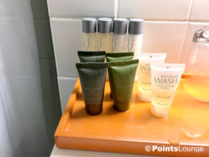 Kudos Spa and Eco.Fresh toiletries are seen in the bathroom of a room at the Stewart Hotel New York City in midtown Manhattan, NY.