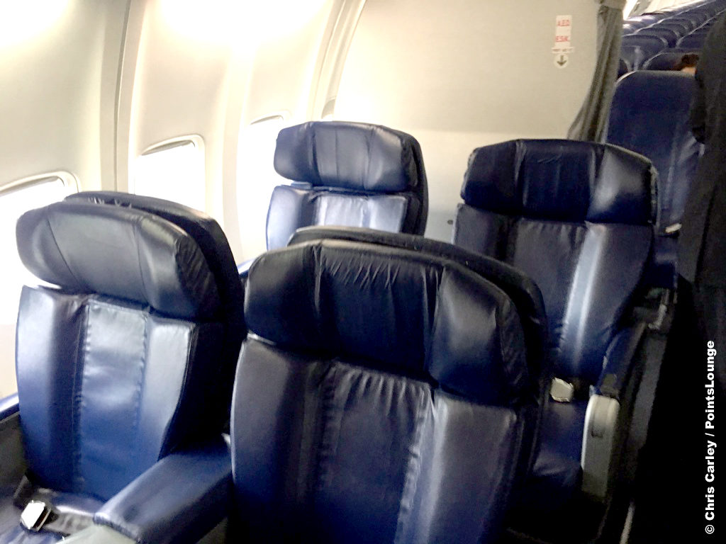 The first class cabin (seats 2D and 2F and 3D and 3F) are seen inside a Sun Country 737-800. © Chris Carley / PointsLounge.