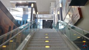 a staircase with glass railings