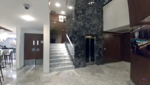 a marble staircase in a building