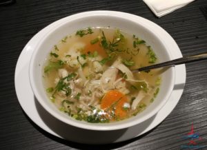 a bowl of soup with a spoon