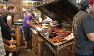 a group of people cooking food