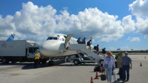 people boarding an airplane