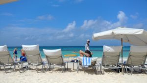 a group of chairs on a beach