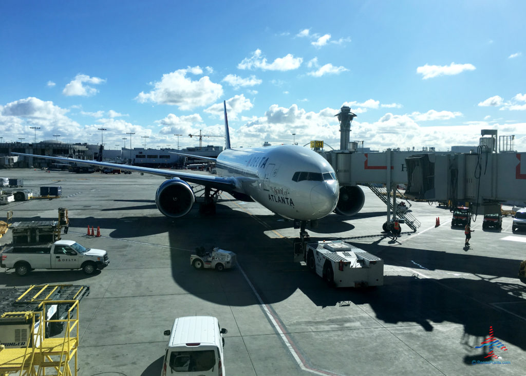 Delta Air Lines' Spirit of Atlanta livery Boeing 777-200LR aircraft, tail number N702DN, is seen at Los Angeles International Airport's (LAX) Tom Bradley International Terminal.