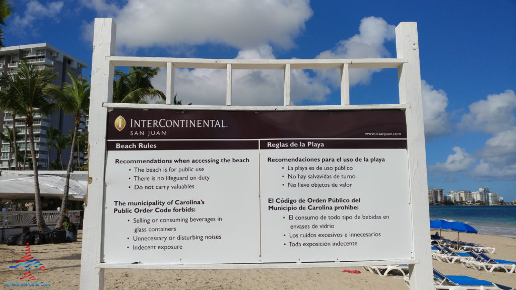 a sign on a beach