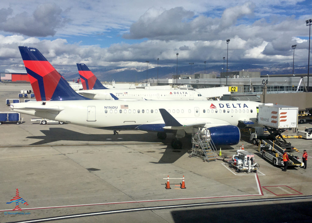 A Delta Air Lines Airbus A220-100, tail number N116DU, is seen at gate C2 of Salt Lake City International Airport (SLC).