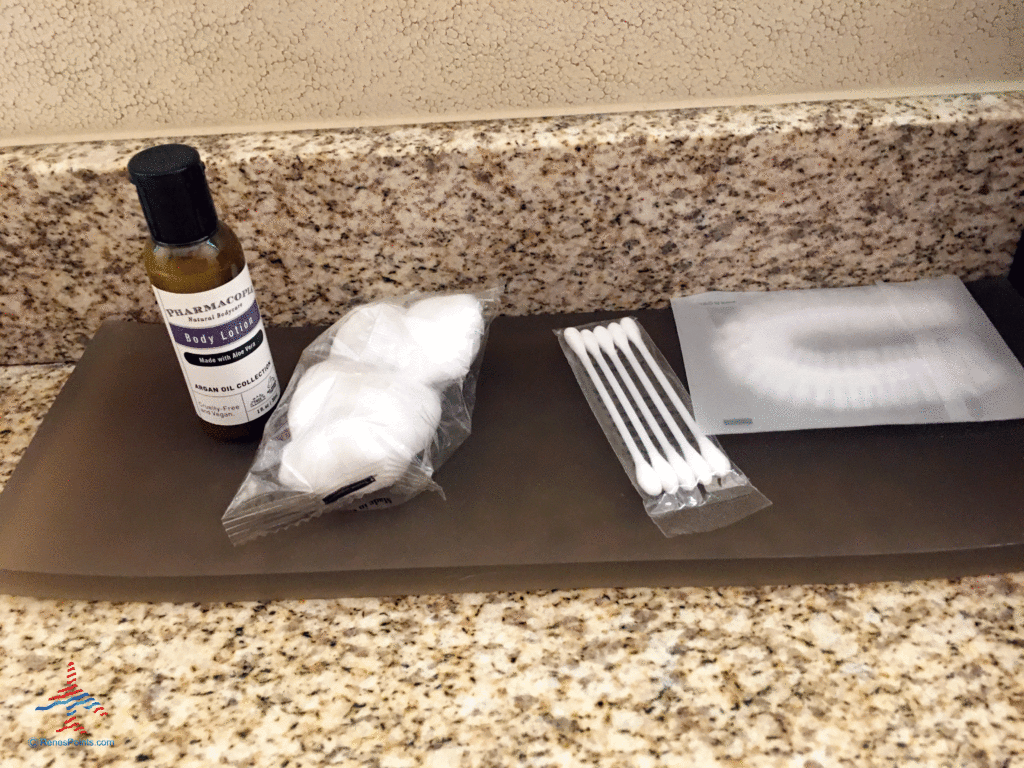 Pharmacopia body lotion, cotton balls, and cotton swabs are seen in an executive king bedroom at the Hyatt Regency O'Hare Chicago airport hotel in Rosemont, Illinois.