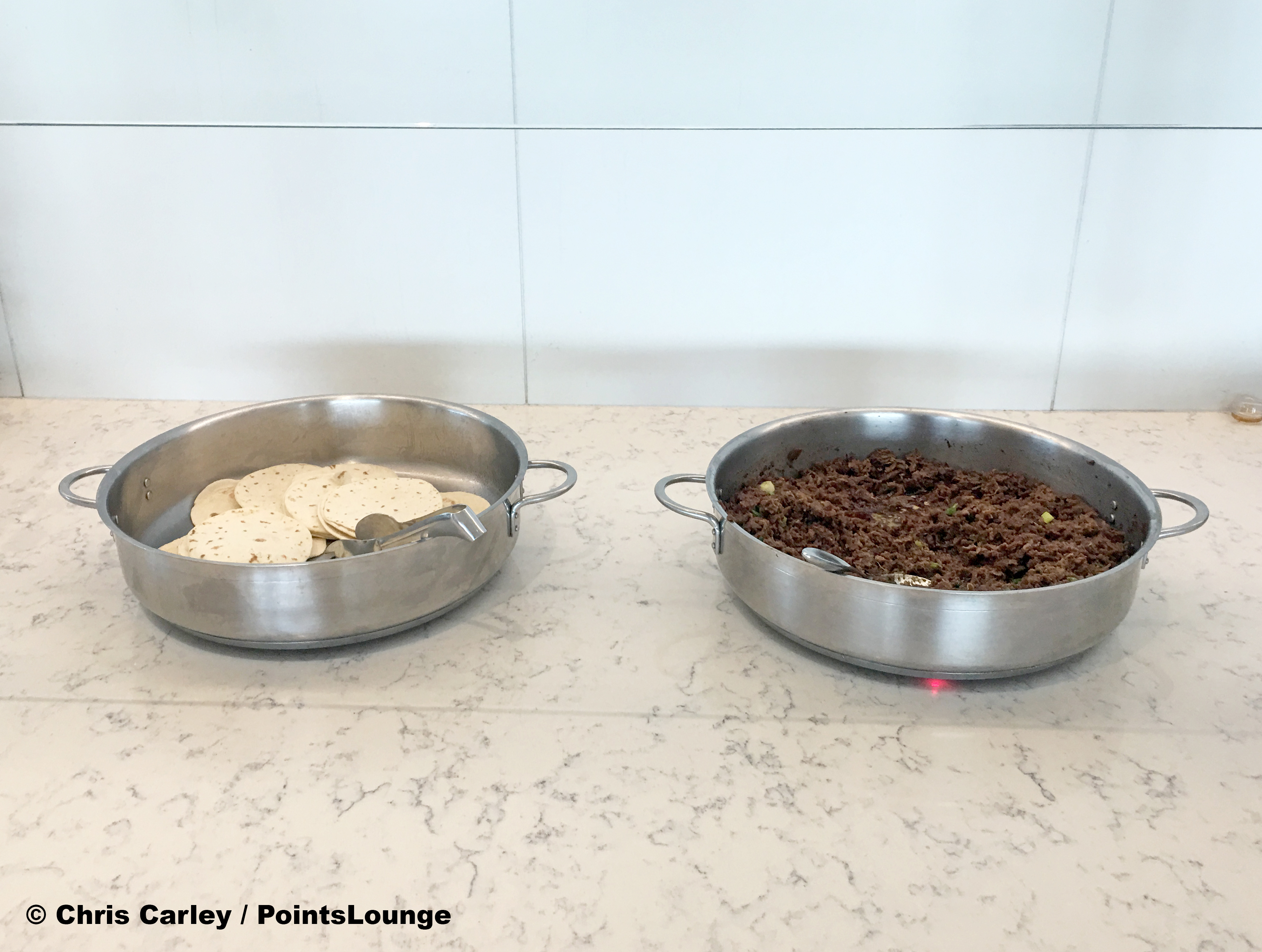 Korean beef and pancakes are seen at the United Club LAX airport lounge in Los Angeles, California.