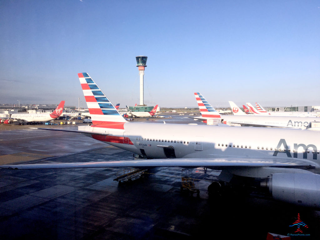 American Airlines planes are seen from inside the Virgin Atlantic Clubhouse airport lounge at London Heathrow Airport (LHR).