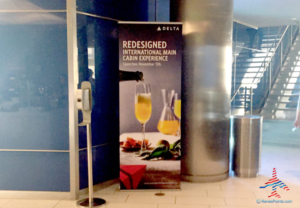 A sign at the Delta Sky Club in Atlanta's F concourse announces Delta's Main Cabin International Service.