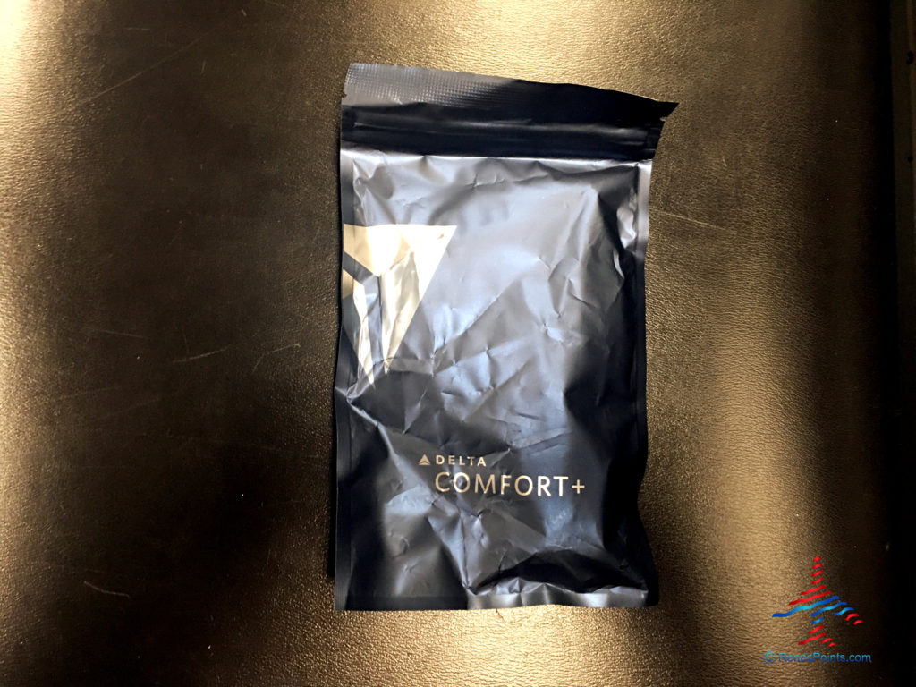 The exterior of a Sleep Kit offered in Comfort+ on Delta Main Cabin International Service.