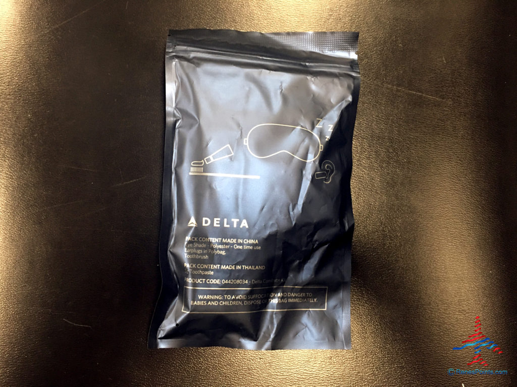 The exterior of a Sleep Kit offered in Comfort+ on Delta Main Cabin International Service.
