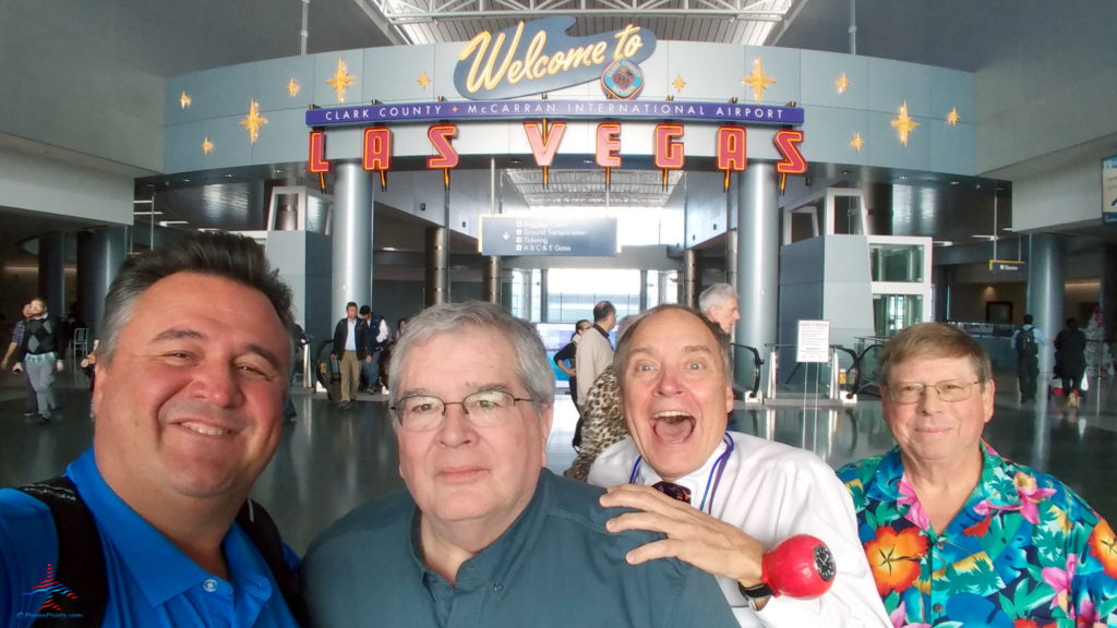 a group of men posing for a photo