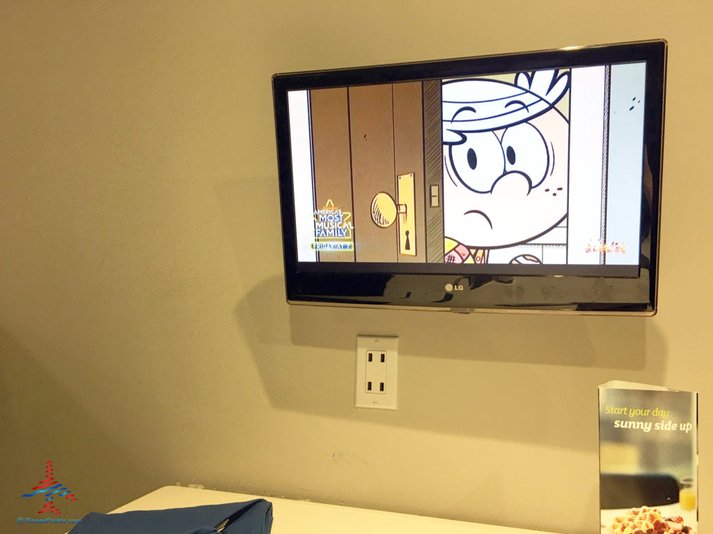 A television and USB ports are seen at Onyx Restaurant inside the Holiday Inn & Suites Anaheim hotel near Disneyland in Anaheim, California.