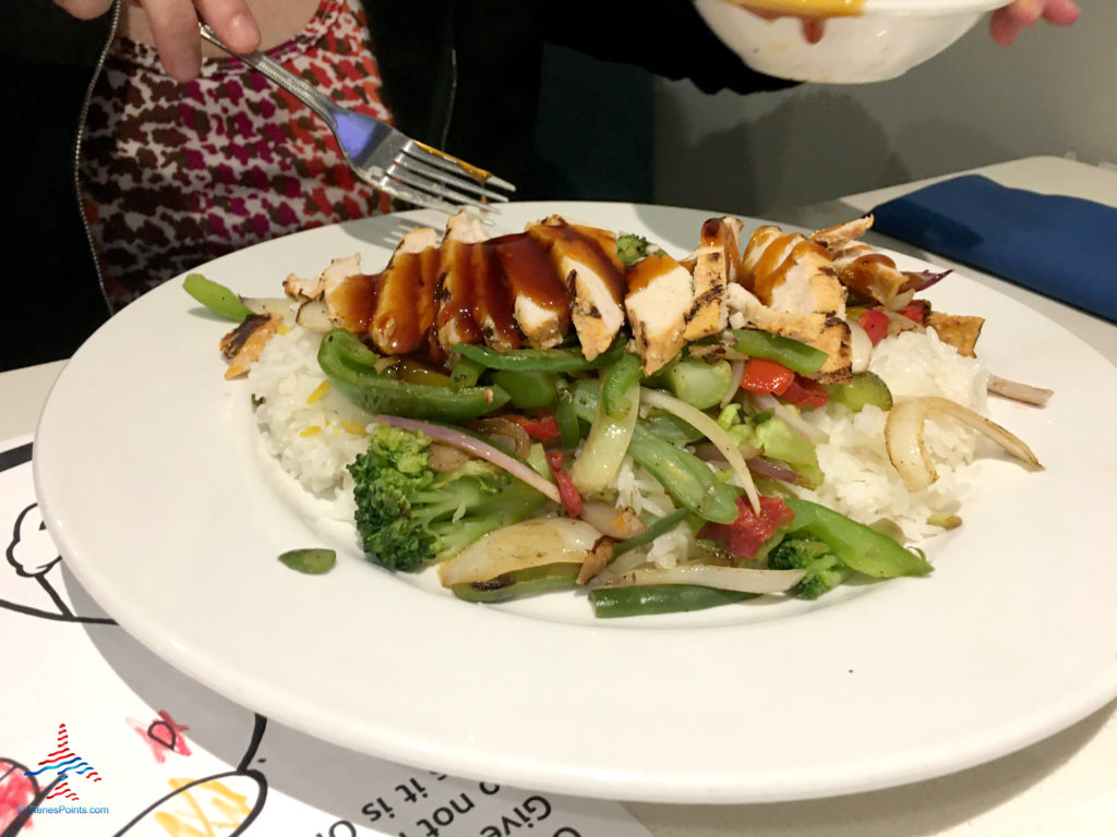 A Thai chicken stirfry is served at Onyx Restaurant inside the Holiday Inn & Suites Anaheim hotel near Disneyland in Anaheim, California.