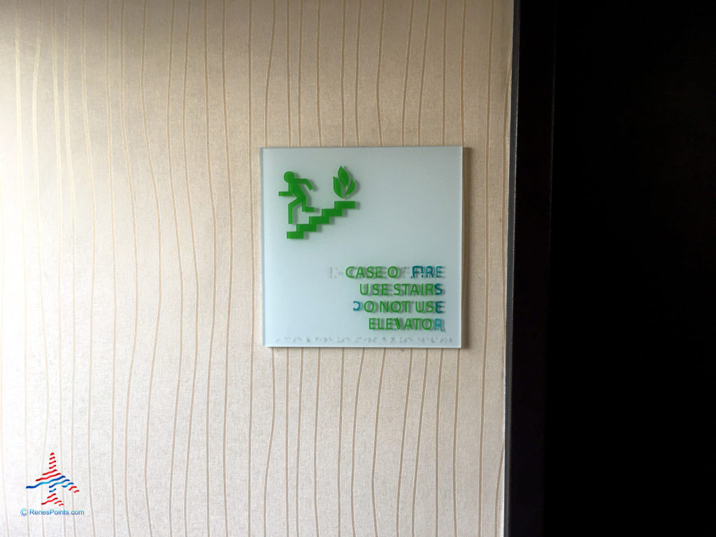 A damaged sign is seen near an elevator at the Holiday Inn & Suites Anaheim hotel near Disneyland in Anaheim, California.