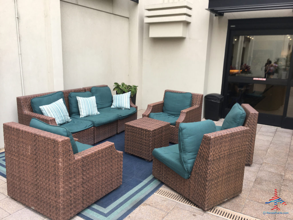 Lounging - patio furniture are seen at the pool area of the Holiday Inn & Suites Anaheim hotel near Disneyland in Anaheim, California.