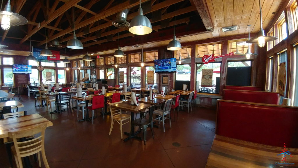 a restaurant with tables and chairs