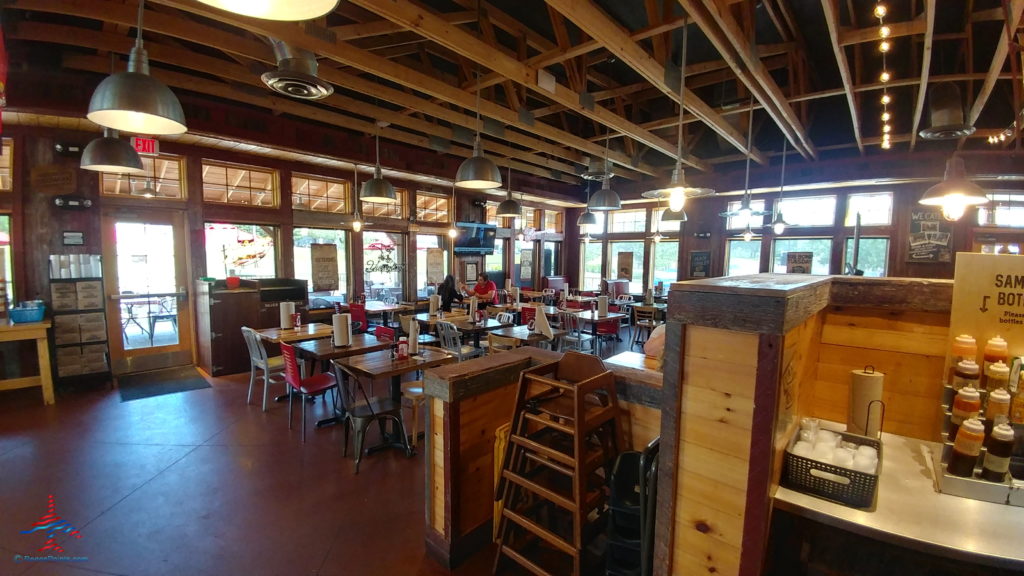 a restaurant with tables and chairs