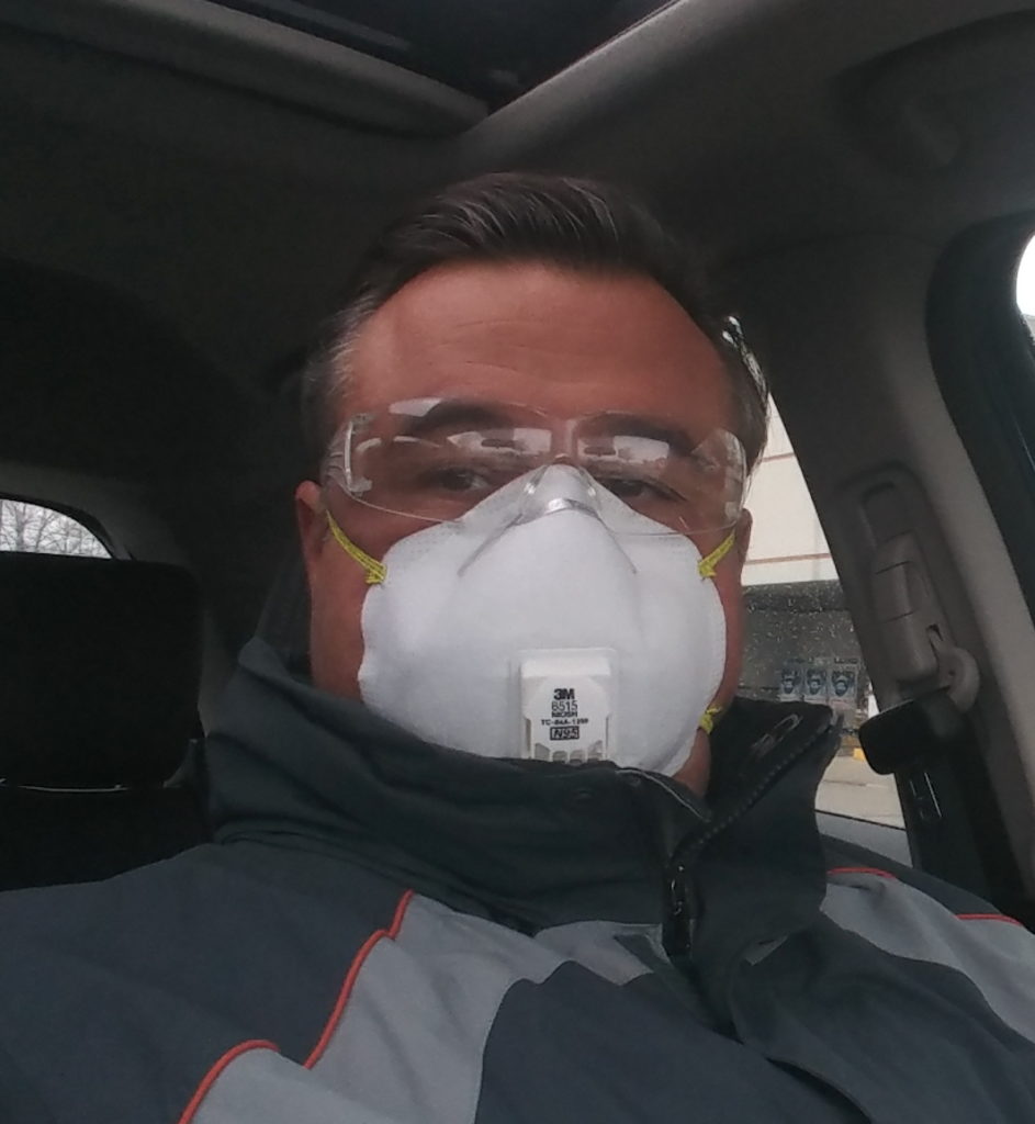 a man wearing a mask and goggles