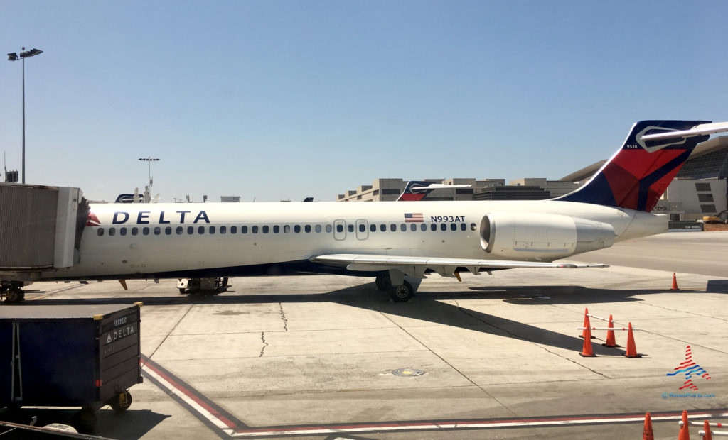 A Delta Air Lines Boeing 717-200 tail number N993AT is seen parked at a Los Angeles International Airport (LAX) gate at Terminal 3.