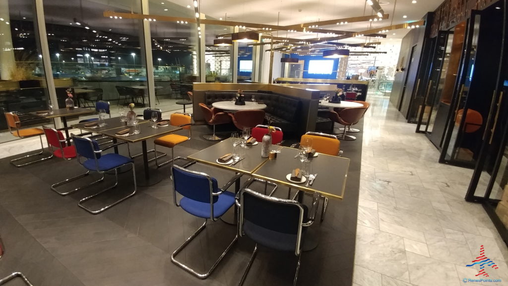 a restaurant with tables and chairs