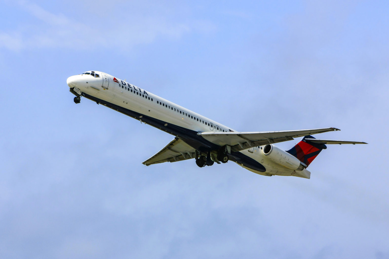 Delta Airlines McDonnell Douglas MD-88 departs Sarasota SRQ airport, FL Delta Airlines McDonnell Douglas MD-88 departs Sarasota SRQ airport, FL