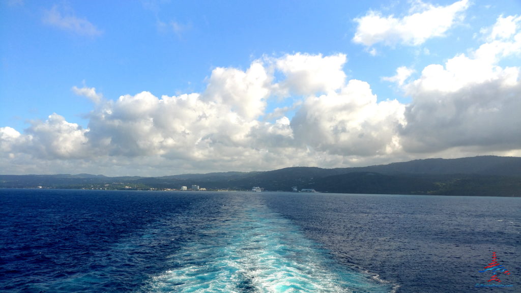 a wake of a boat in the water